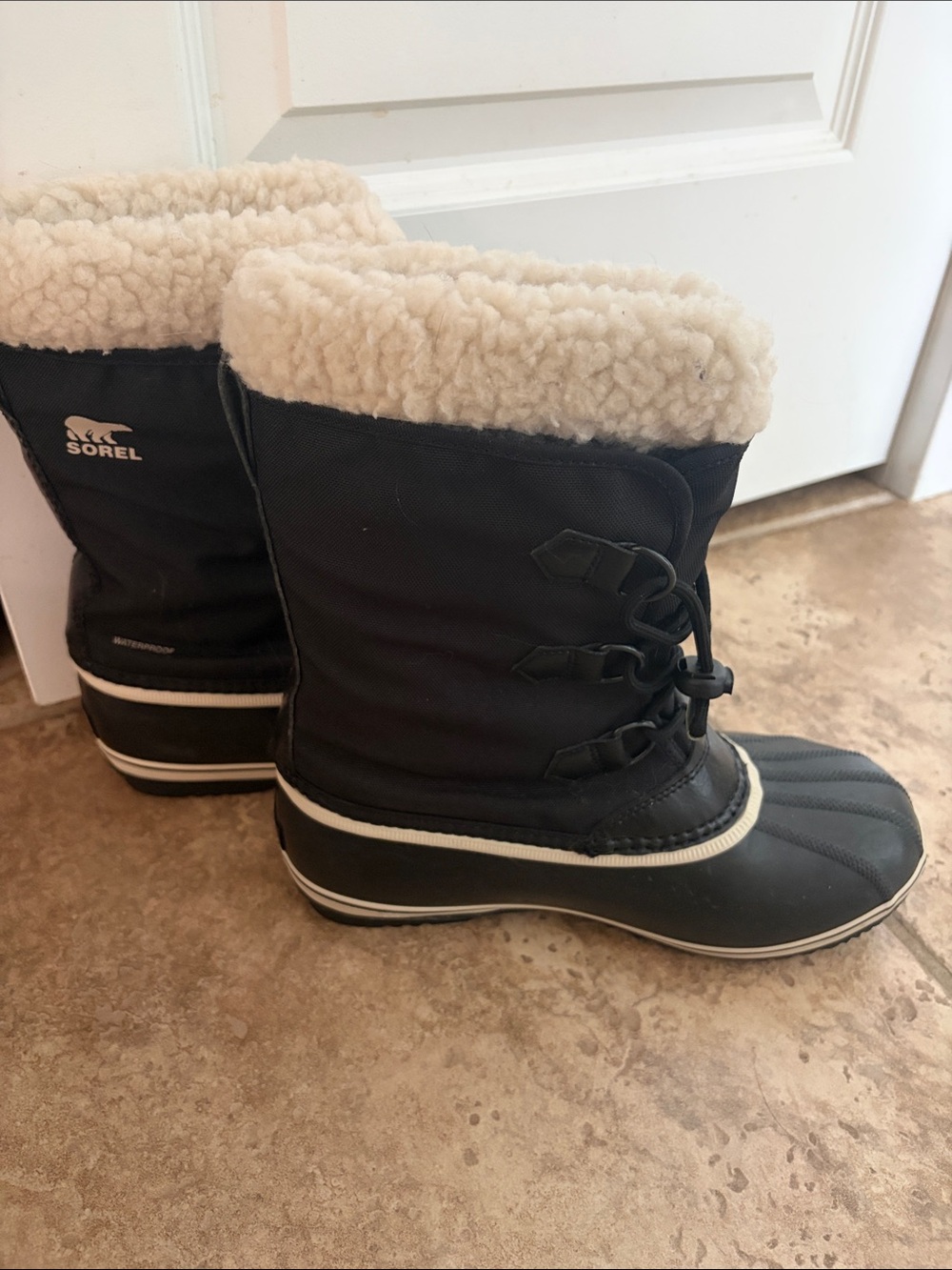 Sorel Kids Black Snow Boots with Cream Sherpa Cuff